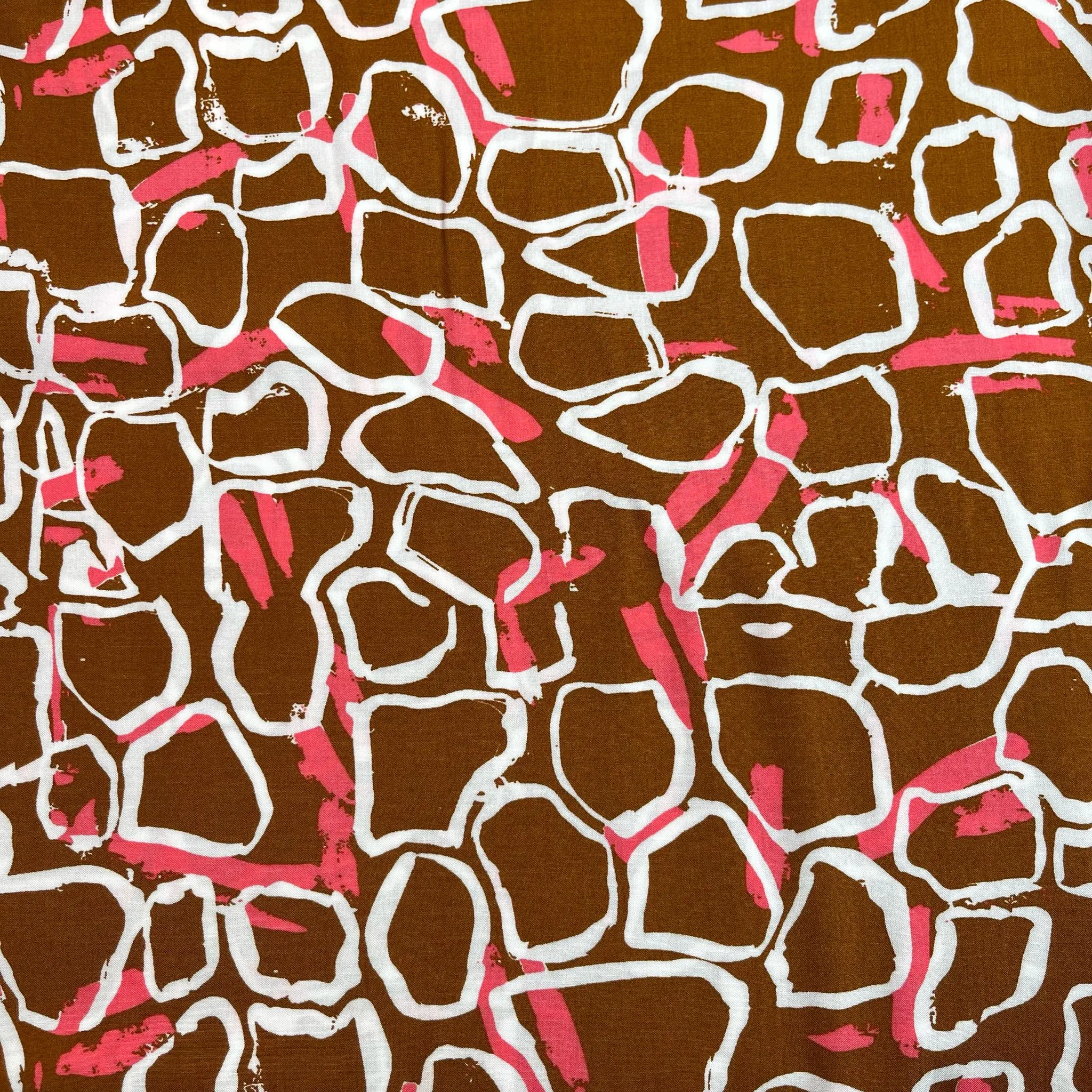 White Shapes on Brown Viscose Fabric