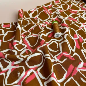 White Shapes on Brown Viscose Fabric
